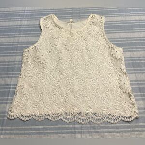 Mine white sheer front top with floral lace design.